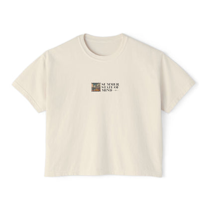 Front view of a cropped t-shirt in off-white with a small retro-style graphic and the text "SUMMER STATE OF MIND" centered on the chest.