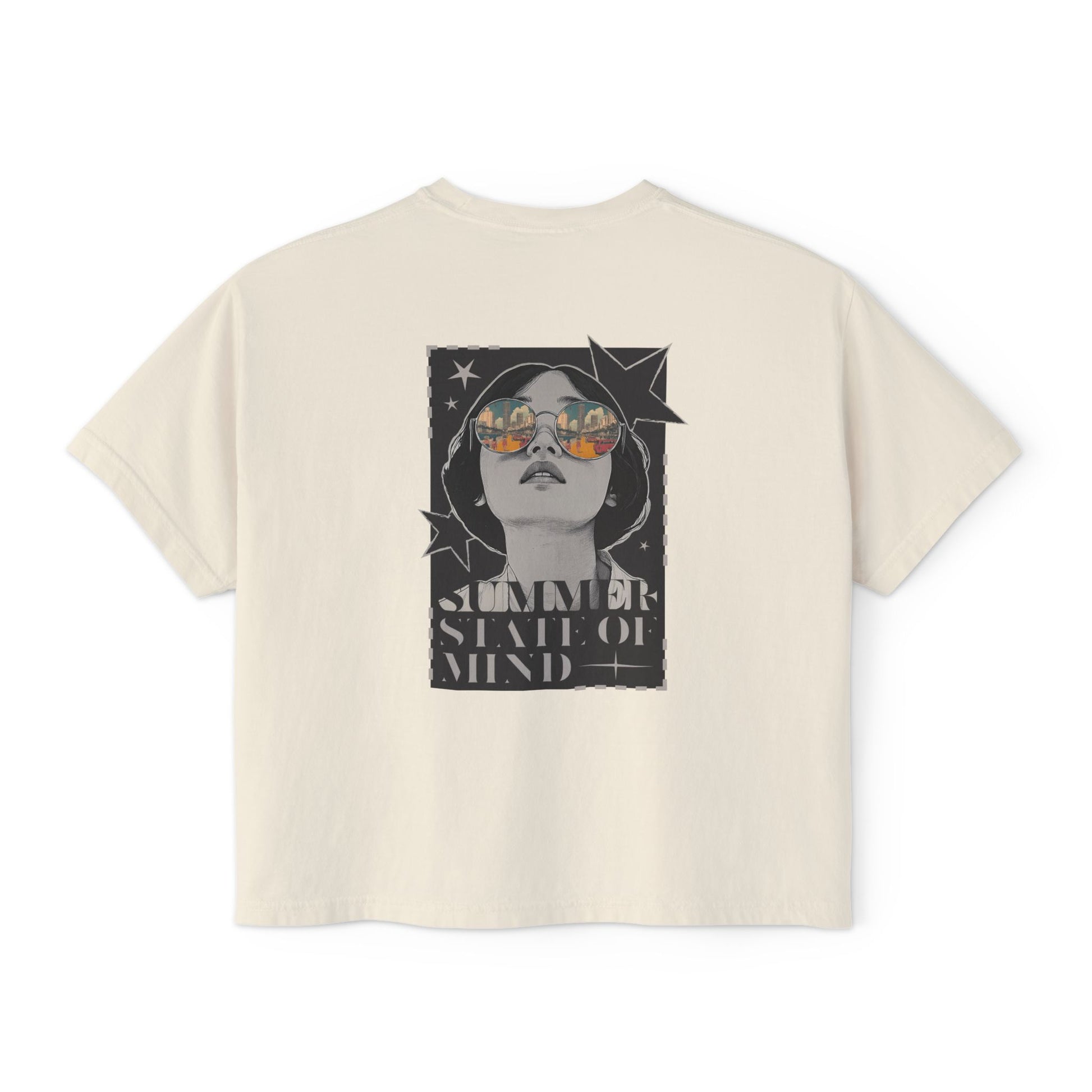 Alt text: Back of a trendy graphic t shirt featuring a bold retro-style illustration of a woman in sunglasses with a summer sunset reflection and "SUMMER STATE OF MIND" lettering